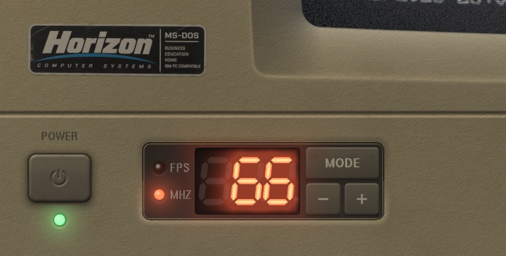 The maker's badge, the power button with its green lamp, and the seven-segment turbo display reading 66