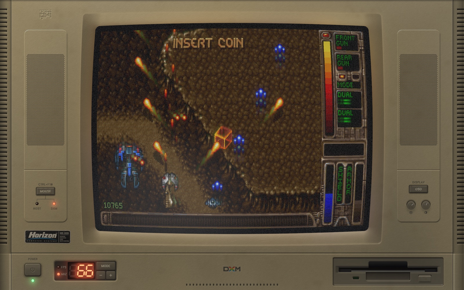 Tyrian 2000 in its attract mode, with INSERT COIN on screen